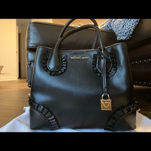 All leather MK purse with gold accents